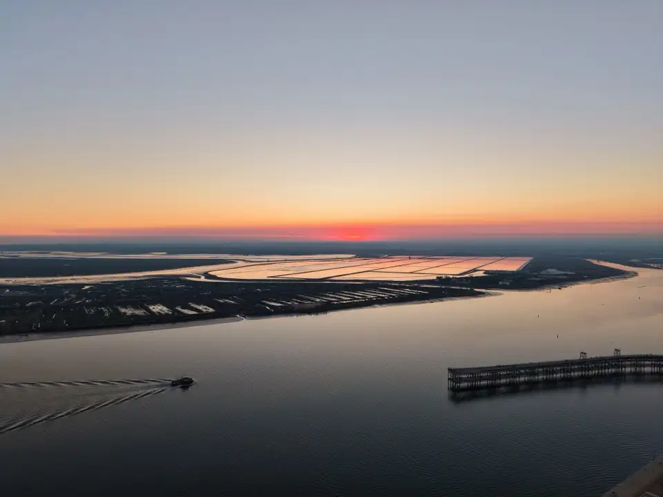 Sunset over the salt marshes, seen from a drone